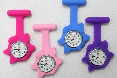 Montre de bracelet de silicone de forme de fleur, montre en caoutchouc de quartz de montre de poche de rotation